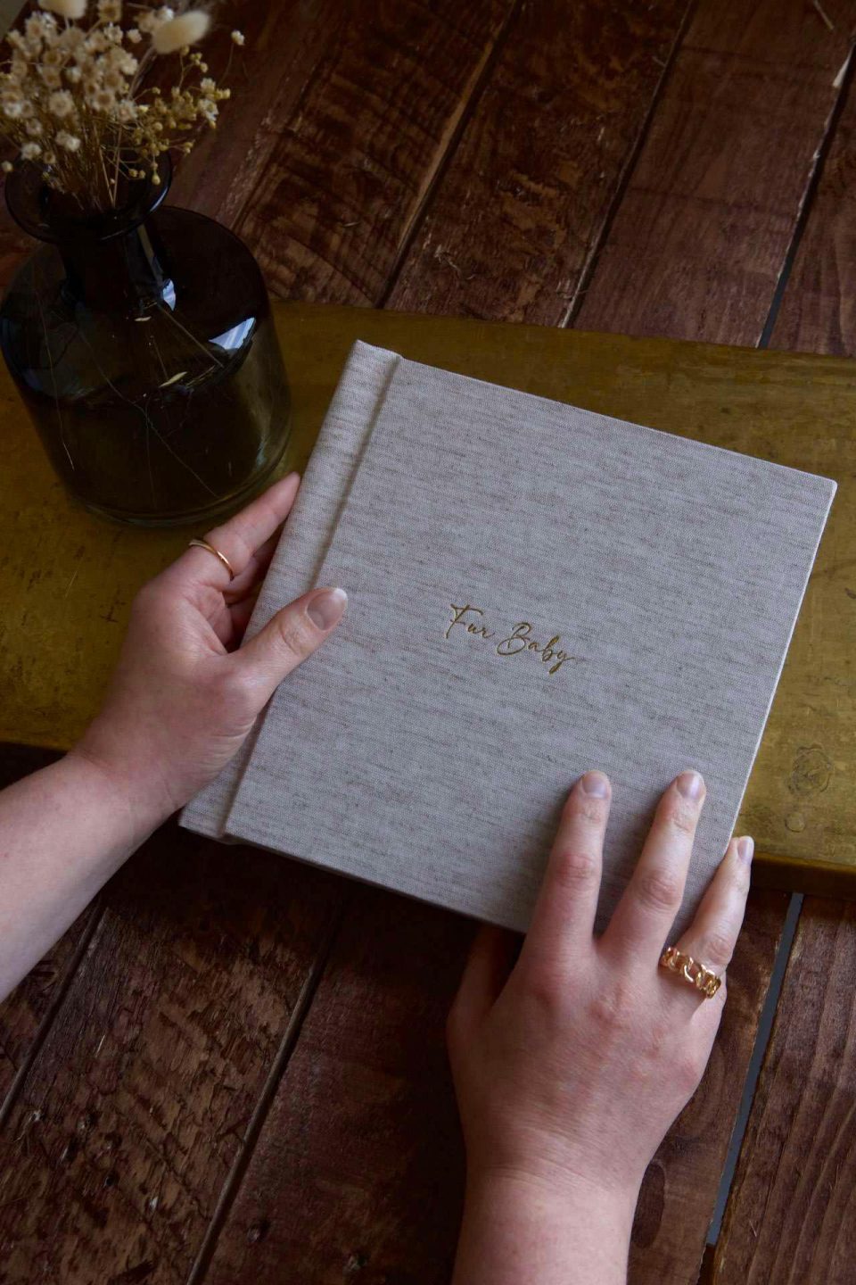 A quality Every_ Album made by Folio being held by a woman