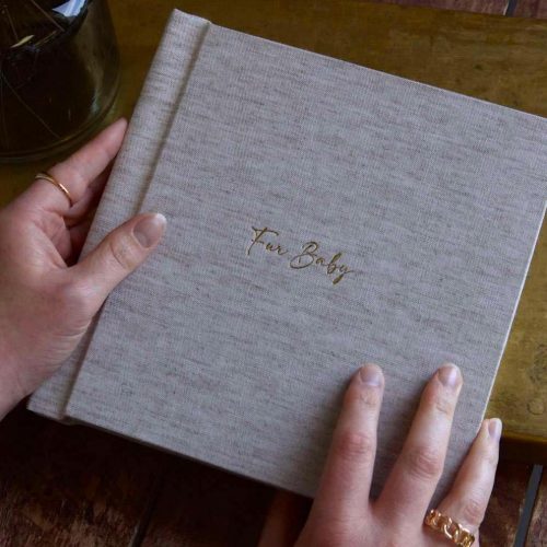 Every day pet photo book made with quality materials and being held