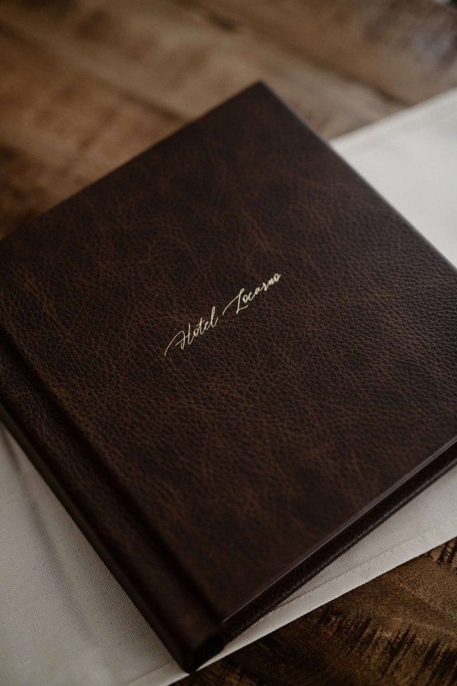 A matted album with gold cover personalisation
