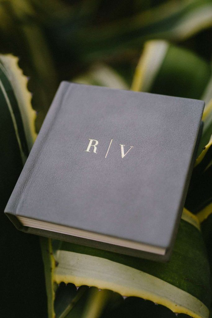 A small square photo book personalised with a custom design
