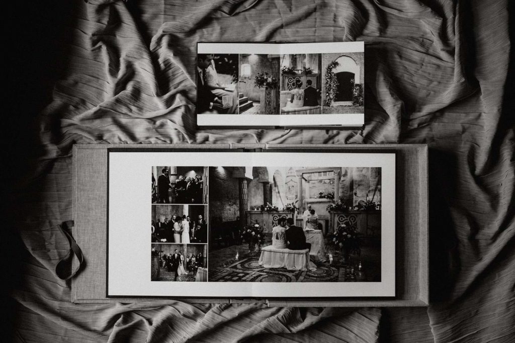 A mini copy album next to a larger fine art photo book