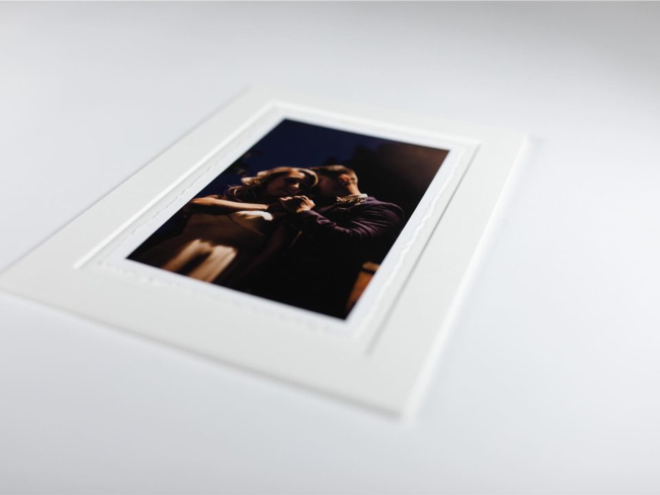A deckle edged fine art print mounted in a bevel edged board to create a unique matted print