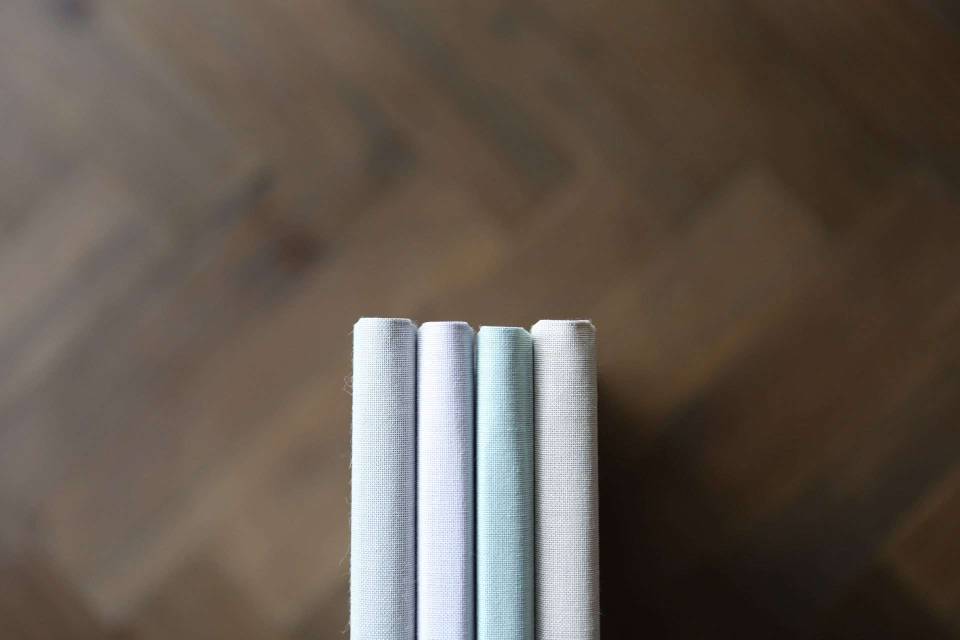 A detail shot of the four colours available for the Luxury Print Folder