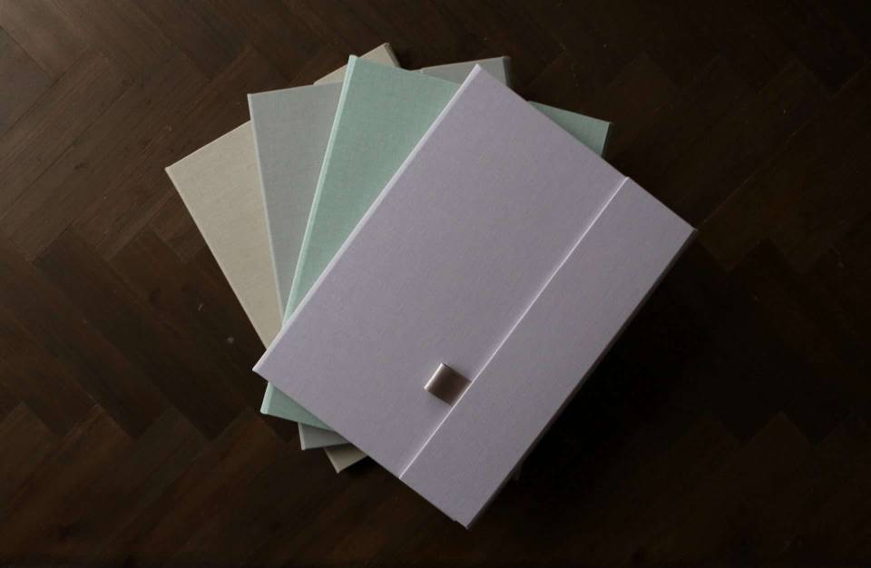 Overhead shot of the four colourways of the Luxury Print Folder