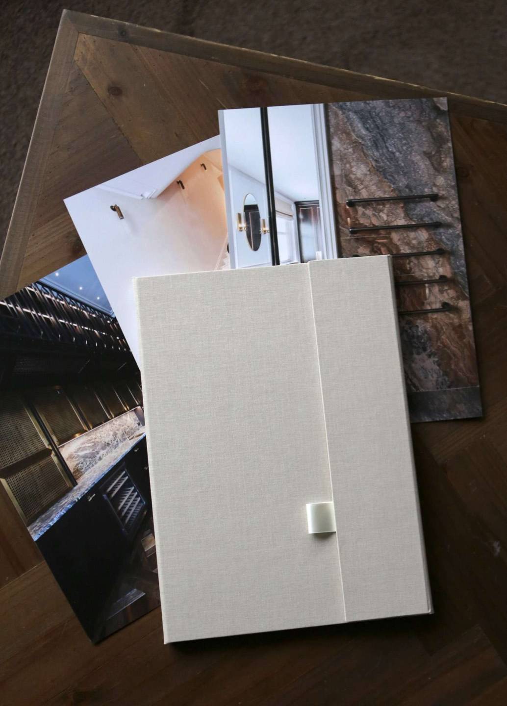 An interior designer's ideal portfolio with a Luxury Print Folder on display from above